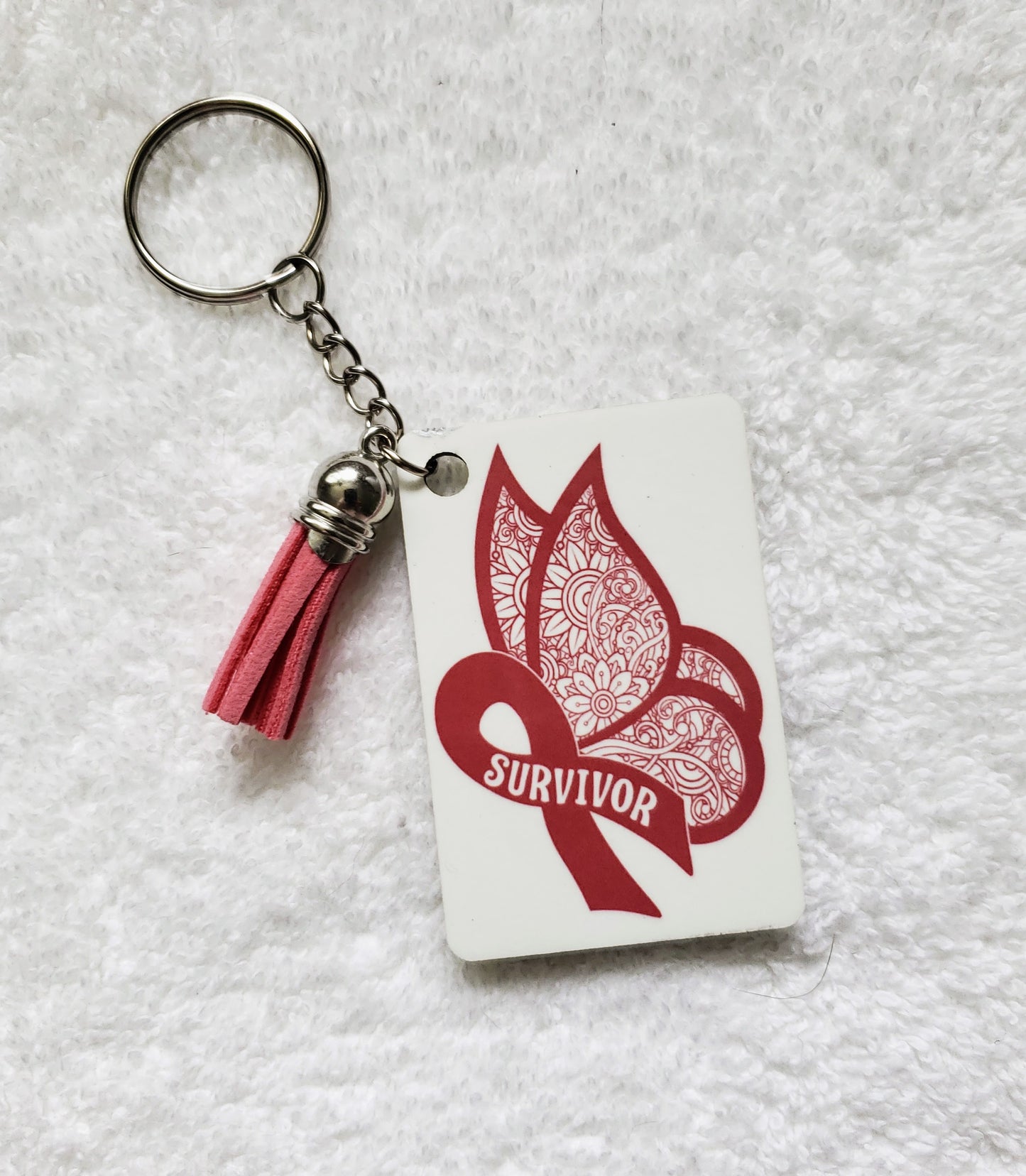 SURVIVOR KEYCHAIN